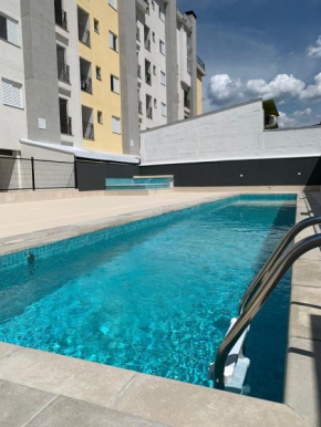 Ap Novo Ubatuba com Varanda Gourmet, Piscina e Wi-Fi